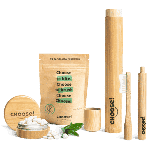 Toothpaste tablets with bamboo toothbrush and case
